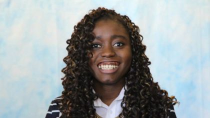 Person with long curly hair