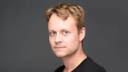 Person with short, blonde hair