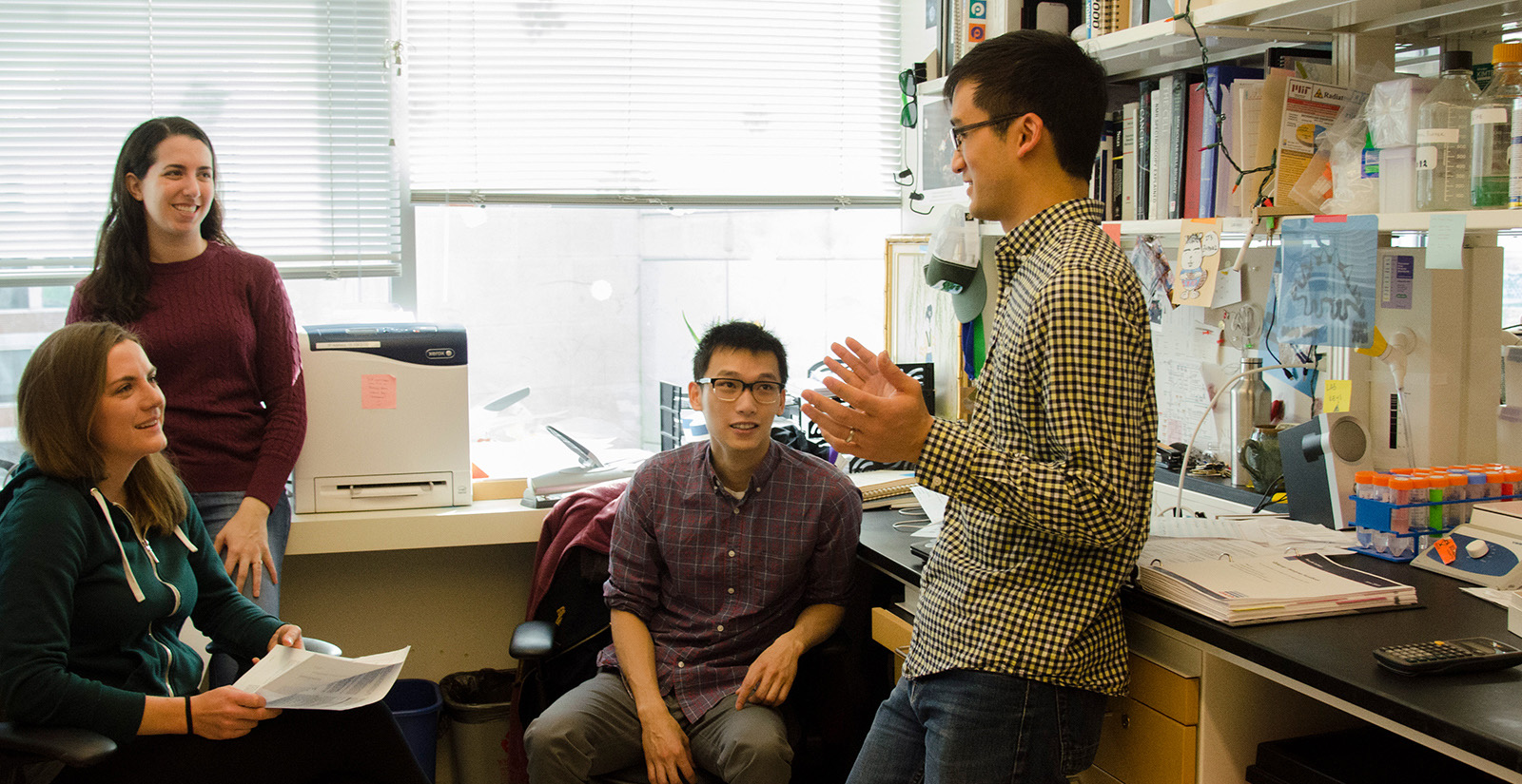 Students chatting in lab space