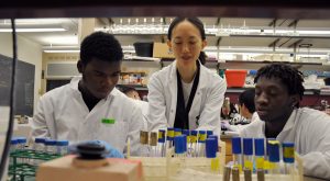 Three people in lab