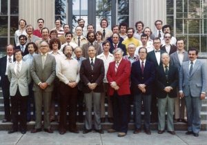 Group picture of faculty members outside MIT